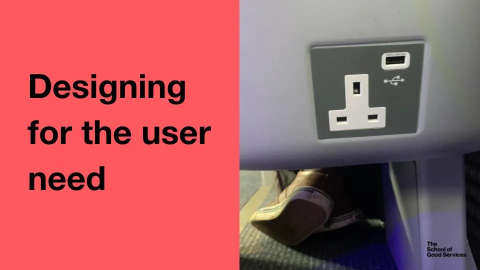 A plug on the back of a train chair